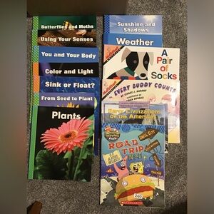13 like new books. Scholastic, DeltaScienceReaders and SpongeBob SquarePants